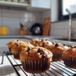 Protein Muffins: The Best 5-Ingredient Recipe for Guilt-Free Gains 7 fresh baked protein muffins on kitchen counter with close-up view