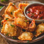 Deep Fried Ravioli: The Crispy, Cheesy Comfort You Didn’t Know You Needed 6 Golden crispy deep fried ravioli appetizer on a wooden board