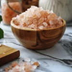 Himalayan Pink Salt Weight Loss Recipe That Nutrition Coaches Love 5 Himalayan pink salt crystals for weight loss recipe in a wooden bowl