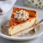 Cinnamon-Vanilla Creamy Custard Pie with golden crust and dusted cinnamon