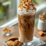 Teddy Graham Iced Latte: A Sweet and Nostalgic Coffee Treat 5 Served Teddy Graham Iced Latte with whipped cream and Teddy Grahams