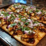 BBQ Chicken Flatbread Pizza with melted cheese and fresh cilantro