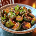 crispy honey sriracha Brussels sprouts on a serving dish