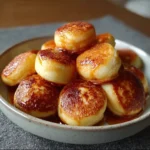 Fluffy Easy Pancake Poppers stacked in a bowl for a cozy breakfast