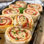 Delicious Italian Pinwheels on a serving platter