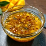 Mango Habanero Honey Garlic Sauce Recipe 4 Homemade mango habanero honey garlic sauce in a glass jar