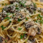 Mushroom and Garlic Spaghetti Dinner: Cozy, Flavorful, and Easy to Make 6 Mushroom and Garlic Spaghetti Dinner plated with parsley and Parmesan