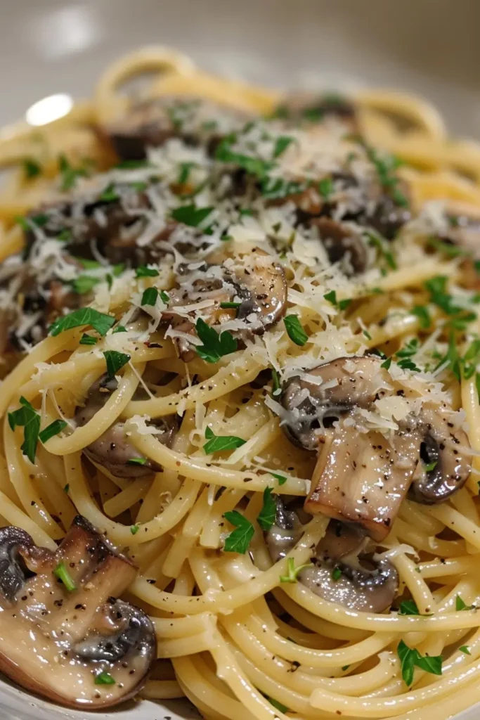 Mushroom and Garlic Spaghetti Dinner: Cozy, Flavorful, and Easy to Make 5 Mushroom and Garlic Spaghetti Dinner plated with parsley and Parmesan