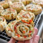 Veggie Pizza Pinwheels sliced and arranged on a platter