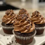 Delicious espresso brownie cupcakes topped with chocolate ganache