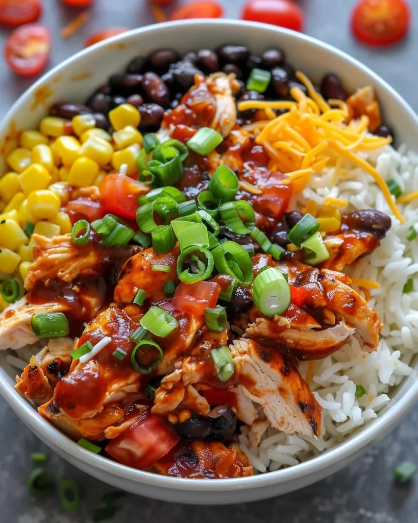 Delicious BBQ chicken bowls with vibrant toppings and flavors.
